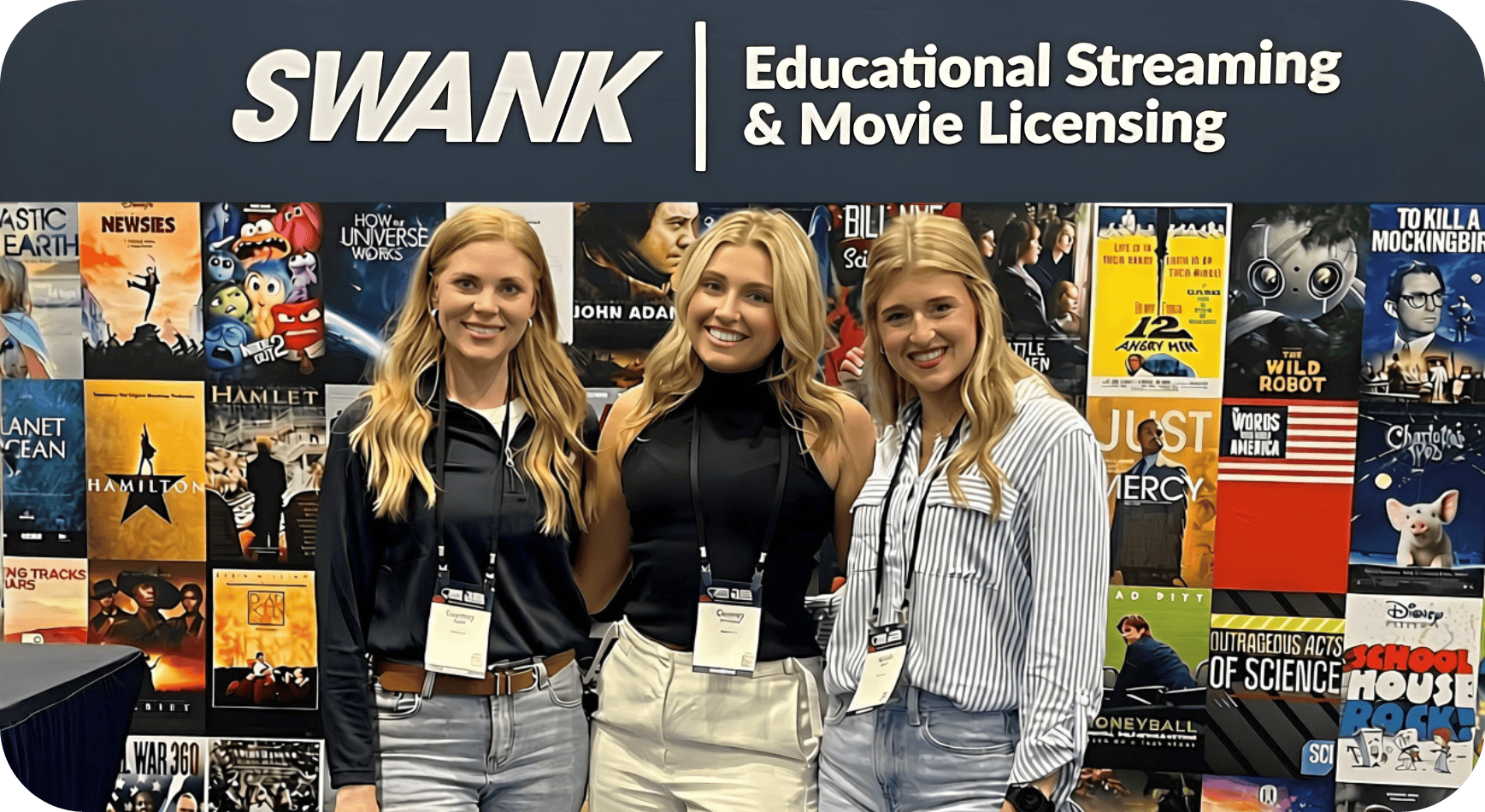 Swank K-12 representatives in front of a conference backdrop with movie covers on it